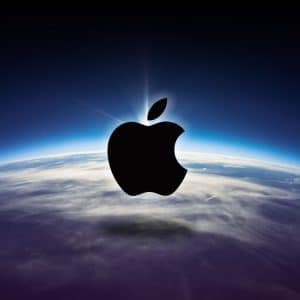The image shows the Apple logo in black, centered over the curvature of the Earth from space. The Earth appears with a blue horizon blending into the dark space above, creating a surreal scene where the logo seems to be hovering above the planet; rumors suggest it might hint at a foldable iPhone.