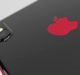 Close-up of the upper rear part of a PRODUCT(RED) iPhone X with a red Apple logo, featuring a dual-lens camera on the top left with a flash. The edges of the phone are also highlighted in red. The background is a soft gradient of light grey, showcasing elegant iPhone X design.