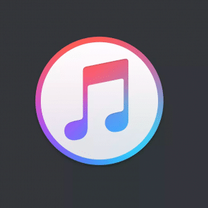 The image shows the iTunes branding logo, featuring a white music note on a circular gradient background that transitions from pink at the top to blue at the bottom. The logo is set against a dark gray background, embodying Apple's sleek design aesthetic. - iTunes wish list