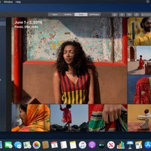 A computer screen displays the Photos app open on a macOS Catalina desktop. The library shows a collection titled "June 1-2, 2019, Panaji, Goa, India." Various vibrant photos depict people and scenes, including a woman in a striped dress, colorful attire, and scenic backgrounds.
