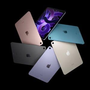 A collection of six Apple iPads is arranged in a circular pattern against a black background, embodying the sleek appeal of major digital gatekeepers. The iPads come in various colors—pink, blue, green, purple, gray, and silver—with one screen at the top displaying a swirling purple abstract design.