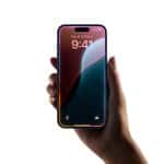 iPhone screen displaying iOS 18.5 beta 1 features, including Mail app toggle options and AppleCare banner in Settings, released April 2, 2025. Siri Privacy.