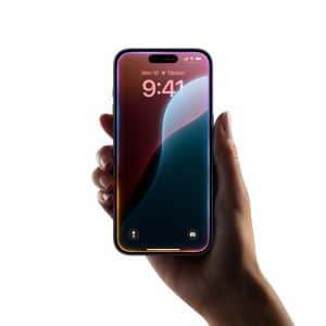 iPhone screen displaying iOS 18.5 beta 1 features, including Mail app toggle options and AppleCare banner in Settings, released April 2, 2025. Siri Privacy.