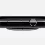 Side view of a black Apple Watch 10. The image highlights the digital crown and side button, focusing on the sleek, glossy finish of the smartwatch. The Apple logo is in the bottom right corner. The watch band is also visible, curving around the edges.