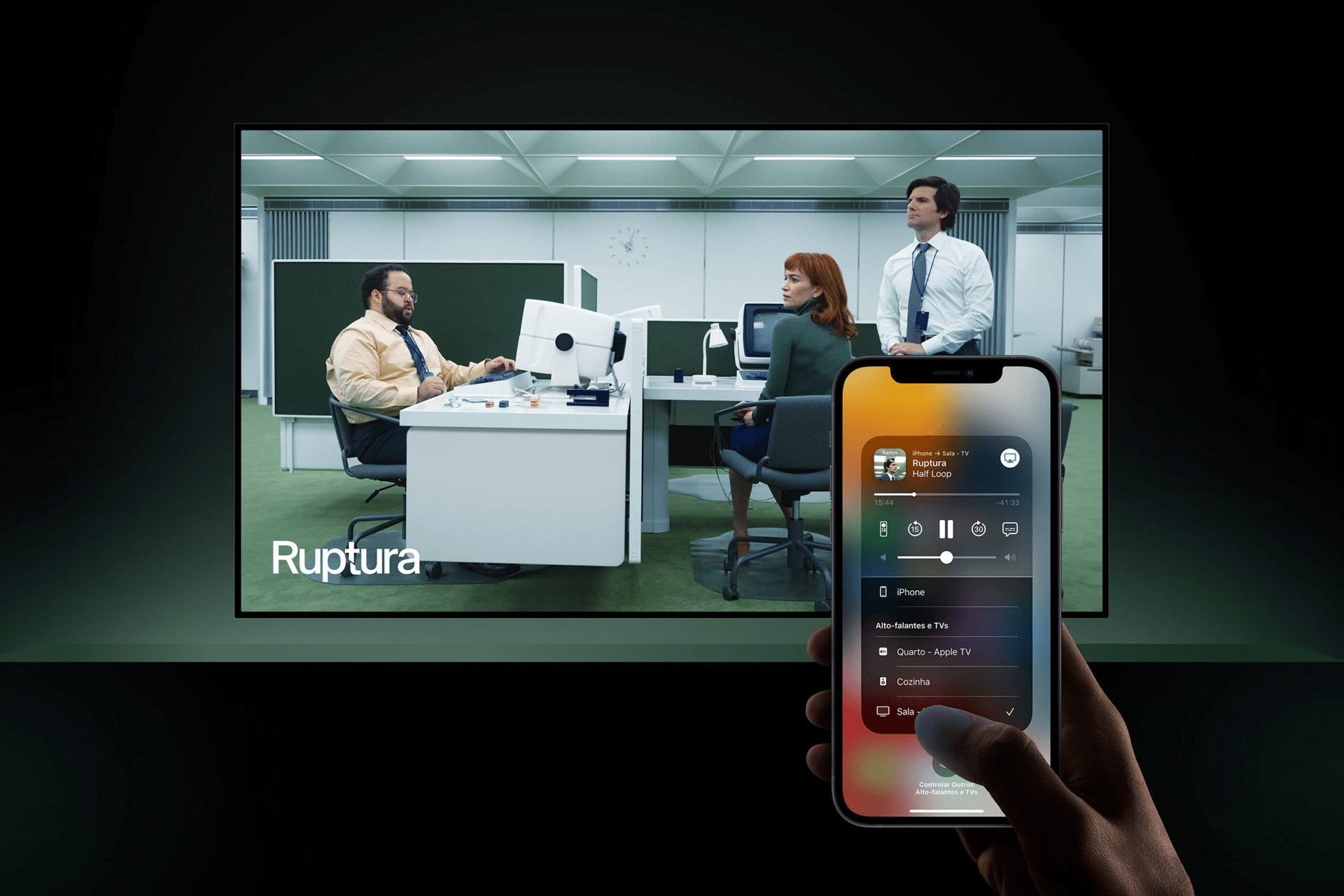 A person uses AirPlay on a smartphone to control media playback, while a TV screen in the background displays a scene from the show "Ruptura," featuring three people in an office setting.