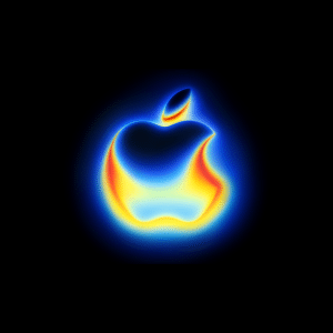 A glowing Apple logo shines with a vibrant gradient of blue, yellow, and red hues on a black background, creating a neon, heat-map effect reminiscent of the iconic style seen at an Apple September event.