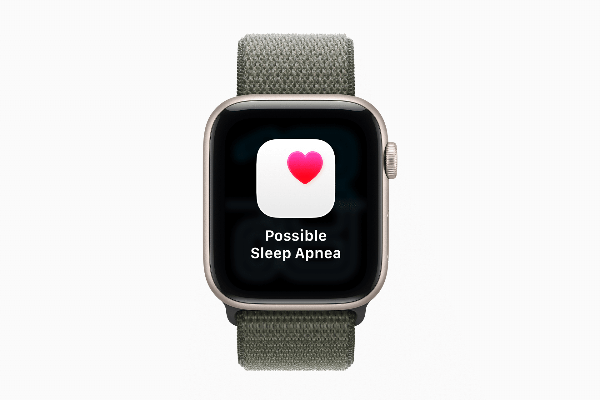 A smartwatch with a green fabric band displays a screen showing a heart icon and the text "Possible Sleep Apnea" on a black background, highlighting advanced features like hypertension alerts.