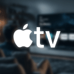 A person sits on a couch in a dimly lit living room, watching a large TV screen. The Apple TV+ becomes Apple TV logo is prominently displayed in the foreground, overlaying the scene.