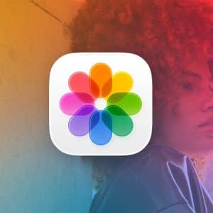 iCloud Photos - A large Apple Photos app icon appears in the center over a colorful gradient background, highlighting iCloud Photos, with a person with curly hair leaning against a wall and looking sideways. The Apple logo is in the bottom right corner.