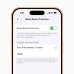A smartphone screen displays the Stolen Device Protection settings, with the protection toggle switched on and options for requiring security delay when away from familiar locations set to "Always"—offering extra security for a stolen iPhone.