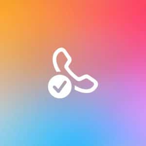 A white phone receiver icon with a check mark, symbolizing a Trusted Phone Number, sits on a gradient background of yellow, orange, pink, and blue shades. The Apple logo appears in the bottom-right corner.