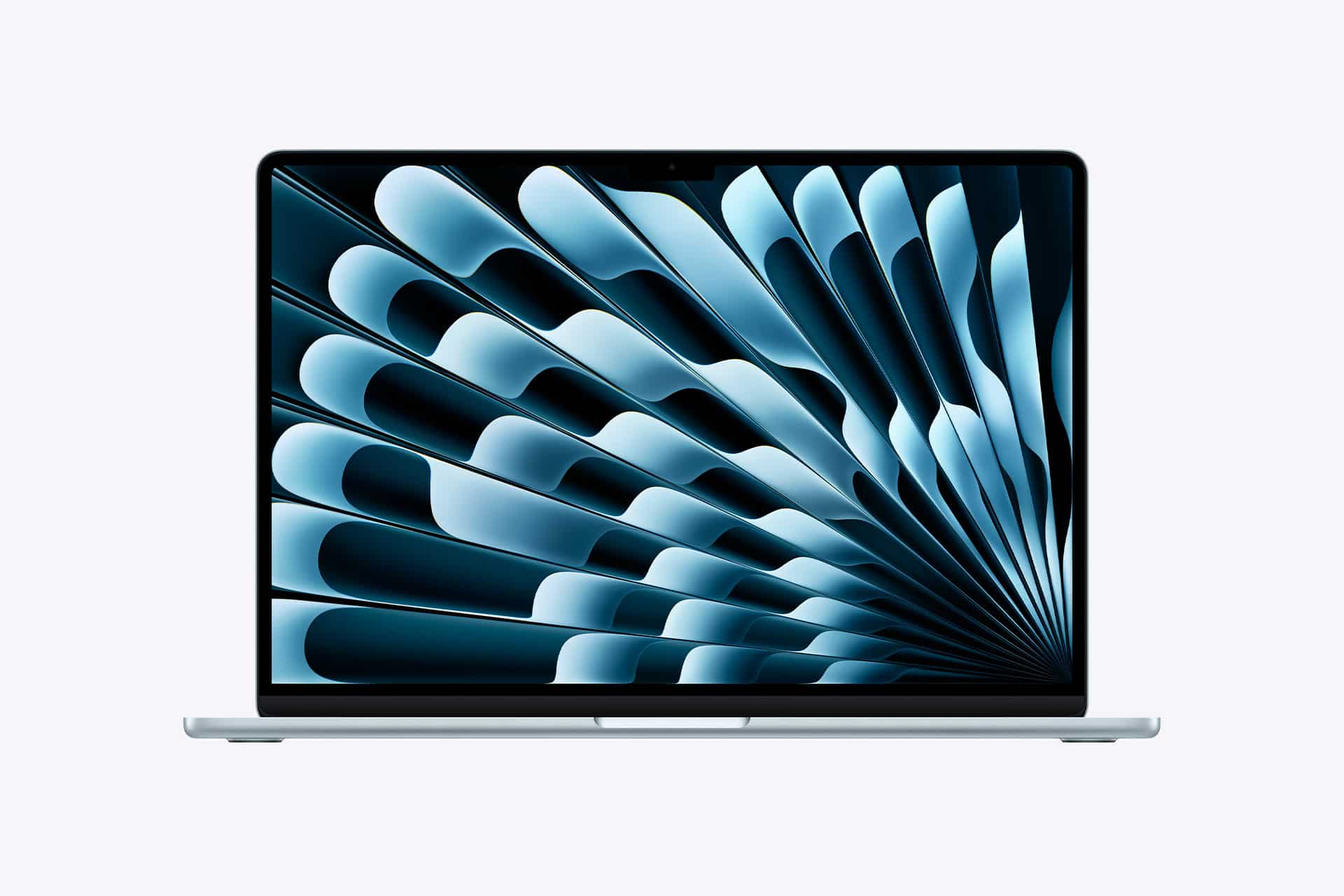 A silver M5 MacBook Air open on a white background displays a blue abstract geometric pattern on its screen. The design features layered, curved shapes radiating from the right side.