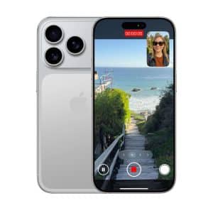 A silver iPhone with three cameras is shown. The screen displays a video recording of a beach path, with a woman appearing in a small FaceTime call window at the top right, highlighting the capabilities of FaceTime Dual Capture on iOS 27.